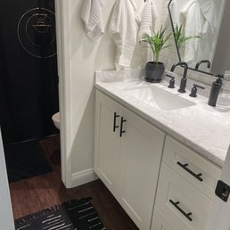 Brand new floors and bathroom cabinets, countertop.