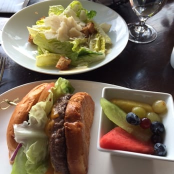 The Loft - The burger (with fruit) and salad split between two. - New American Near Me - Laguna Beach, California