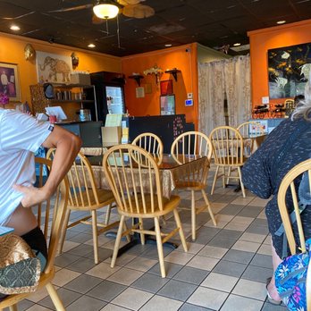 Thai Table Time - people sitting at tables in a restaurant - Thai Near Me - Oceanside, California