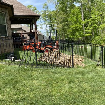 Combat Drain Cleaning & Septic Services - Mini backhoe was able to slip right through the small fence opening - Plumbing Near Me - Clarksville, Tennessee Combat Drain Cleaning & Septic Services - Mini backhoe was able to slip right through the small fence opening - Plumbing Near Me - Clarksville, Tennessee