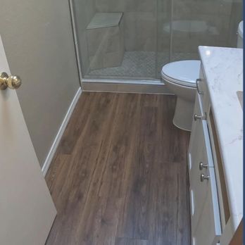DVC Construction - New flooring, tiled shower, glass doors, new cabinet refacing - General Contractors Near Me