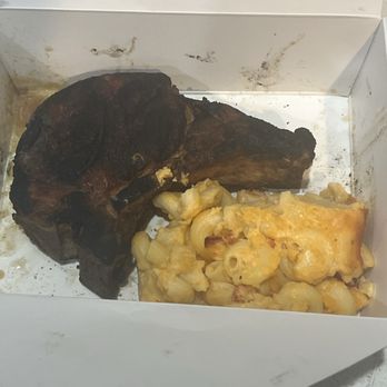 Charley's Steak House - Flame Grilled Pork Chop with Lobster Mac and Cheese - Steakhouses Near Me - Kissimmee, Florida