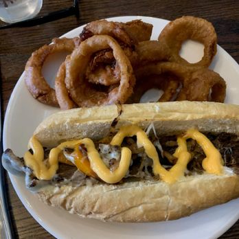 Main Street Tavern - Steak and Cheese with Onion Rings. Excellent. - New American Near Me - Orange, Virginia Main Street Tavern - Steak and Cheese with Onion Rings. Excellent. - New American Near Me - Orange, Virginia