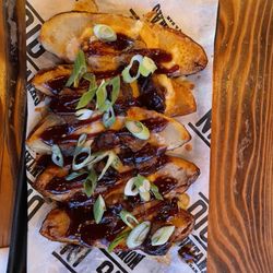 Montana's - Potato skins with braised beef so tasty