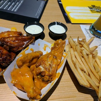 Buffalo Wild Wings - Medium and honey BBQ with some fries and blue cheese dip :) - American Near Me - Wilmington, North Carolina