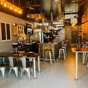Taco Dive - tables and chairs in a restaurant - Mexican Near Me - Fort Pierce, Florida Taco Dive - tables and chairs in a restaurant - Mexican Near Me - Fort Pierce, Florida