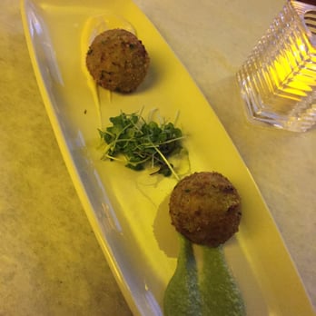 Siena Restaurant - Sweet pea arancini with mozzarella and sun dried  tomato inside over a lemon aioli and sweet pea purée - Diners Near Me - Snyder, New York