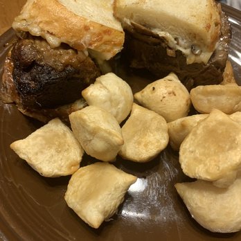 Hilltop Restaurant & Bar - Special of the day: Pot roast sandwich on garlic bread with mushroom gravy and a side of pierogi. - Bars Near Me - Lockport, New York