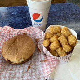 Large chili cheese burger and tots. Large chili cheese burger and tots.