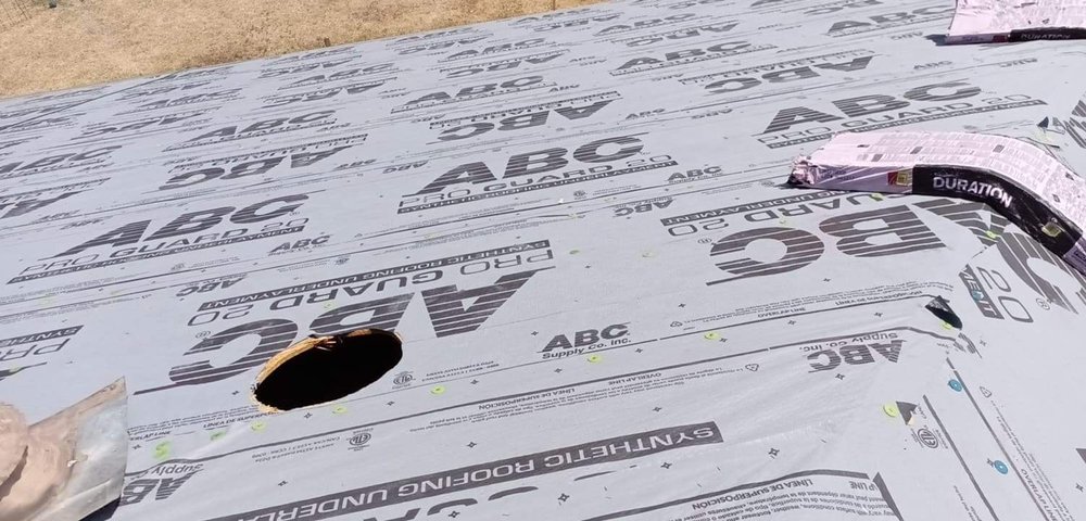 Slide of Regio's Roofing