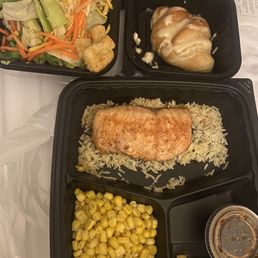 Grilled Salmon Grilled, blackened or bourbon-glazed over rice. With two sides. Available in 5oz