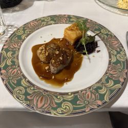 La Encarnacion - Pork entree with cabbage, potatoes & peppers
