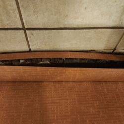Empire Beauty School - This is bathroom sink falling off wall w mold