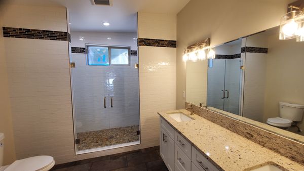 Burns Bathroom Remodel - Our customer was needing a Bathroom for there Master Bedroom so removed some extra closet space and came up with this Contemporary Design to accommodate function and comfort. Having separate showers in one space and a 6ft Double bowl vanity is just what they needed. Burns Bathroom Remodel - Our customer was needing a Bathroom for there Master Bedroom so removed some extra closet space and came up with this Contemporary Design to accommodate function and comfort. Having separate showers in one space and a 6ft Double bowl vanity is just what they needed.