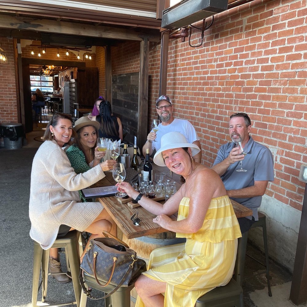 Coomber Craft Wines - The patio is perfect for catching up with friends in our beautiful SoCal weather - Wine Tasting Room Near Me - Oceanside, California Coomber Craft Wines - The patio is perfect for catching up with friends in our beautiful SoCal weather - Wine Tasting Room Near Me - Oceanside, California