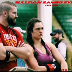 FusBoxe Mixed Martial Arts - Coach Michael Sullivan with a student of FusBoxe SAMBO Systems and winner of 2014 Colorado Thai Championships.