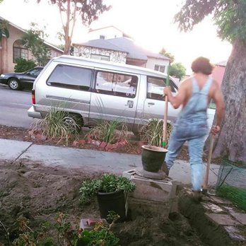 Lawn Bunny - a woman digging a hole in the ground - Landscaping Near Me Lawn Bunny - a woman digging a hole in the ground - Landscaping Near Me