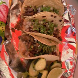 Central Market - Tripas tacos for me and asada tacos for him