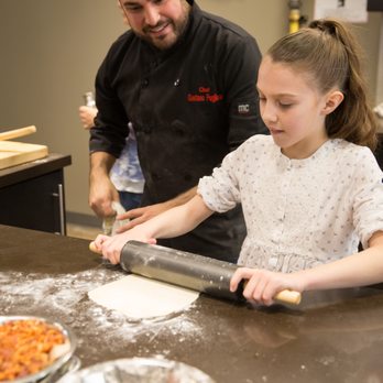 The Chef Upstairs - Grand Opening Party - Chef Gaetano assisting our Junior Chef with fresh made pizza - Cooking Classes Near Me - Vaughan, Ontario The Chef Upstairs - Grand Opening Party - Chef Gaetano assisting our Junior Chef with fresh made pizza - Cooking Classes Near Me - Vaughan, Ontario