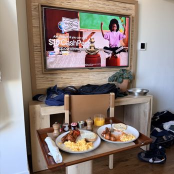1 Hotel Seattle - Morning relaxation with breakfast and TV - Hotels Near Me - Seattle, Washington