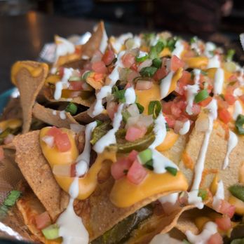 Dark Sky Brewing - Nachos.  Very close to perfect. But WHY would you degrade a good thing, that already has real cheese, with cheez whiz / liquid queso! Smh - Breweries Near Me - Flagstaff, Arizona