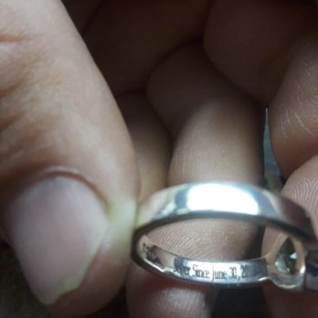 Executive Jewelers - This is the photo George sent once the ring was ready to show that he was able to laser engrave the inscription successfully. - Jewelry Repair Near Me - Mansfield, Texas
