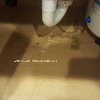 Rincon Property Management - Water damage under sink from tenant - Property Management Near Me - Ventura, California Rincon Property Management - Water damage under sink from tenant - Property Management Near Me - Ventura, California