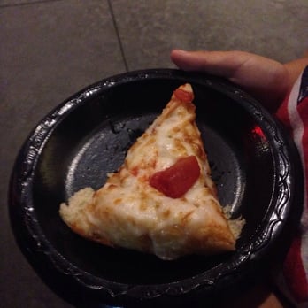 BJ's Restaurant & Brewhouse - Free slice of pizza while waiting for our table very good service - New American Near Me - Downey, California