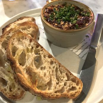 Taproot - Pimento cheese topped with chive snips and glistening smoked Benton ham jam, ready to spread on sourdough toast - New American Near Me - Norwalk, Connecticut