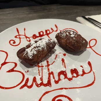 Hook & Vine - Kitchen and Bar - My husband's birthday and they did this for him. Beignets! - Seafood Near Me - North Beach, Maryland Hook & Vine - Kitchen and Bar - My husband's birthday and they did this for him. Beignets! - Seafood Near Me - North Beach, Maryland