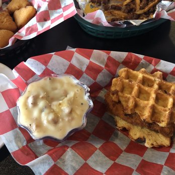 Weidner's Corner 2 - Chicken and waffle sandwich with sausage gravy on the side - Bars Near Me - Baltimore, Ohio
