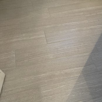 Sir Grout Richmond - Bathroom floor with new, clean, bright grout. - Flooring Near Me Sir Grout Richmond - Bathroom floor with new, clean, bright grout. - Flooring Near Me