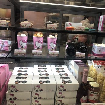 Hello Kitty Cafe - Glass case at cafe with treats that are available for purchase - Cafes Near Me - Irvine, California