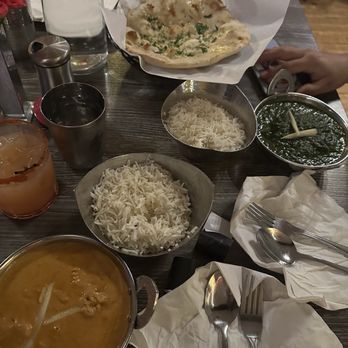Nasha - Tikka Masala the bottom left & Saab to the right with garlic naan - Indian Near Me - Austin, Texas