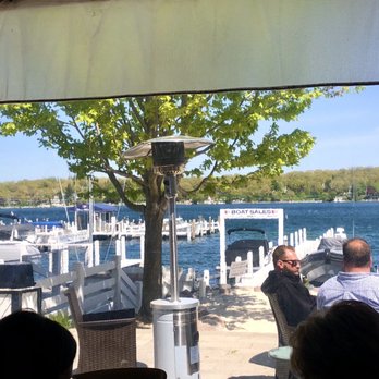 PIER 290 - The view from our table - they had the plastic down because of wind, but it was still nice. - American Near Me - Williams Bay, Wisconsin PIER 290 - The view from our table - they had the plastic down because of wind, but it was still nice. - American Near Me - Williams Bay, Wisconsin