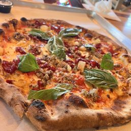 Similar to Margarita with sausage, red sauce