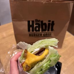 Lettuce-wrapped charburger with cheese Lettuce-wrapped charburger with cheese