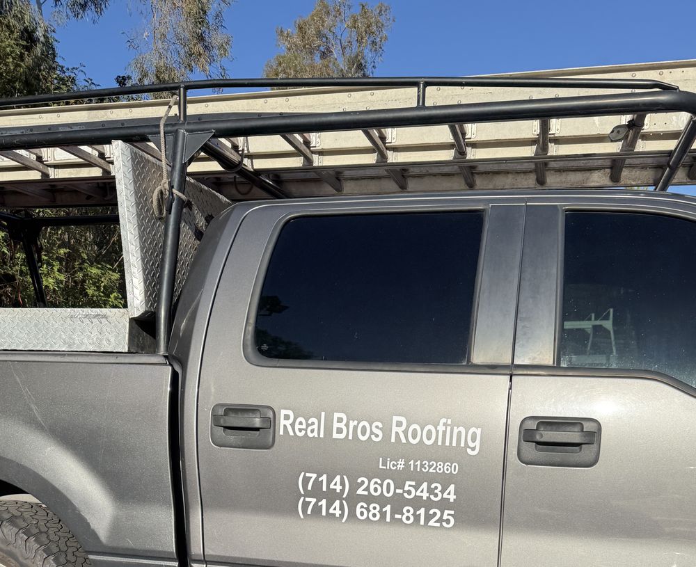 Slide of Real Bros Roofing