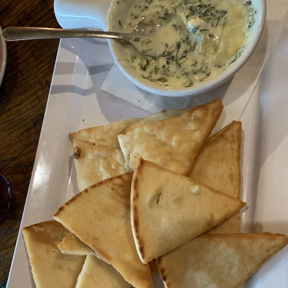 Marshall Steakhouse - Spinach and artichoke dip with home made pita. - Steakhouses Near Me - Holly Springs, Mississippi