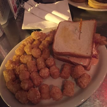 Vortex Bar & Grill - House Double with special sauce sided with tots - American Near Me - Atlanta, Georgia Vortex Bar & Grill - House Double with special sauce sided with tots - American Near Me - Atlanta, Georgia