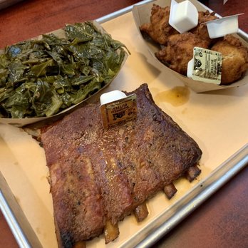Two Drummers Smokehouse - Smoked pork ribs, collard greens, & hush puppies - Barbeque Near Me - Toano, Virginia