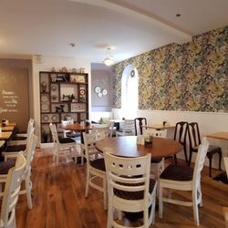 Toffee And Thyme - Just one side of Toffee and Thyme cafe. Lots of seating. Spotless Clean.  Great daily Specials.