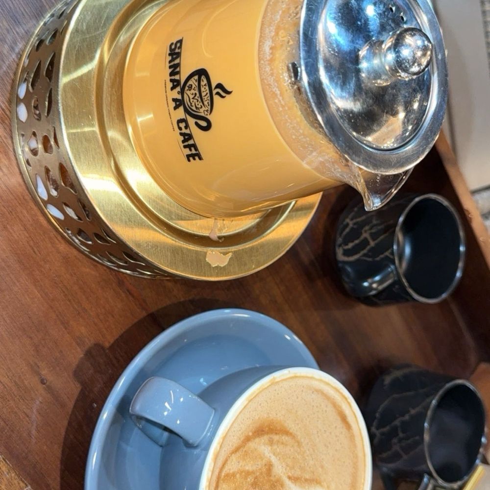 Sana'a Cafe - Adani Chai Biscoff Latte - Coffee & Tea Near Me - Sacramento, California Sana'a Cafe - Adani Chai Biscoff Latte - Coffee & Tea Near Me - Sacramento, California