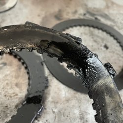 Rushman Automotive Transmissions - Badly burned clutch from an automatic transmission.