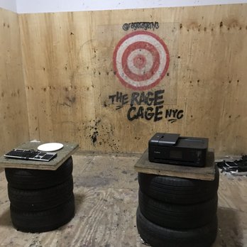 The Rage Cage - destruction fodder: plates, a keyboard and a printer - Team Building Activities Near Me - Brooklyn, New York