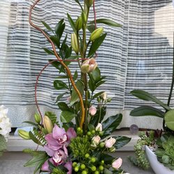 Pacific Palisades Village Florist - Pink lillies, pink orchids, pink spray roses, green coffe beans.