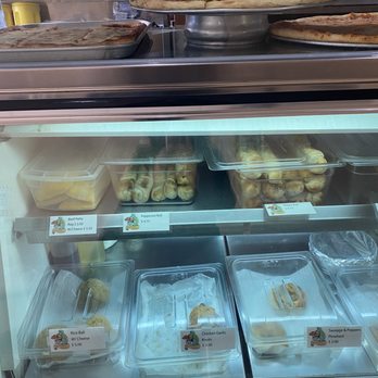 Danny Pizzeria and Restaurant - a display case filled with food - Pizza Near Me - Queens, New York Danny Pizzeria and Restaurant - a display case filled with food - Pizza Near Me - Queens, New York