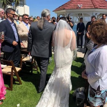My Bridal Alterations - Her train looked beautiful as Dad walked her down the grassy aisle. - Sewing & Alterations Near Me - Oceanside, California My Bridal Alterations - Her train looked beautiful as Dad walked her down the grassy aisle. - Sewing & Alterations Near Me - Oceanside, California