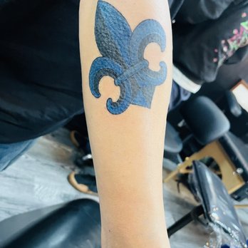 The Hive Tattoo - Fleur de lis  hubby's arm - Tattoo Near Me - Fullerton, California