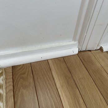 Southern Premier Hardwood Flooring - a closeup of the base of a door - Flooring Near Me - Pinehurst, North Carolina